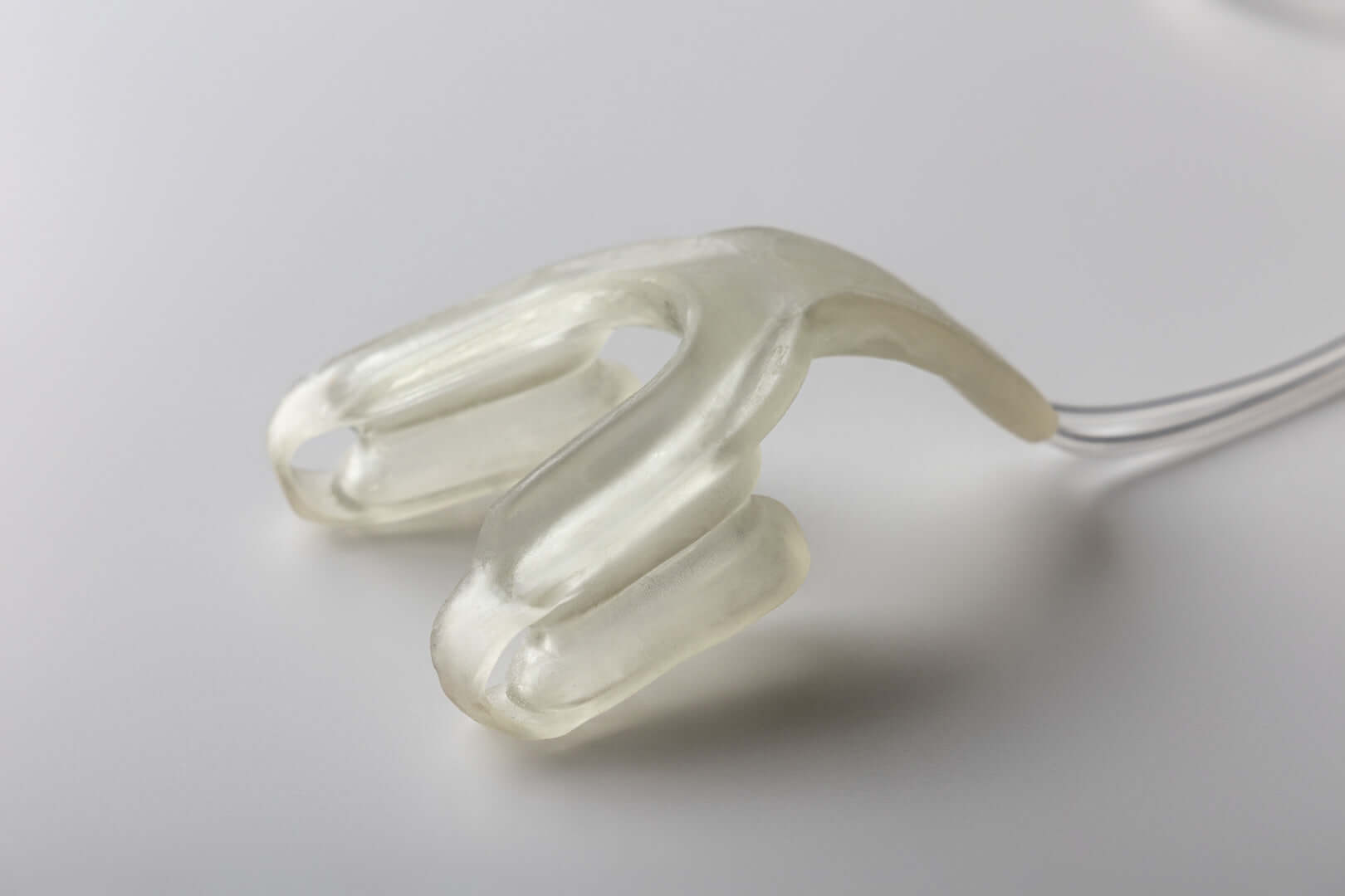 Isences® TMD Physio Care™ jaw mobility exercise device for rehabilitation and controlled movement training.